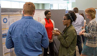 Participants discuss their research 