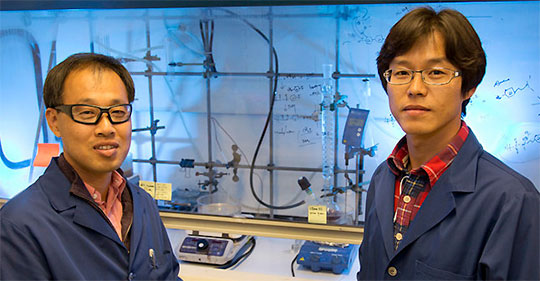 Photo. Yu Seung Kim (left) and Kwan-­‐Soo Lee (right) are part of the team that developed the new class of fuel cells.