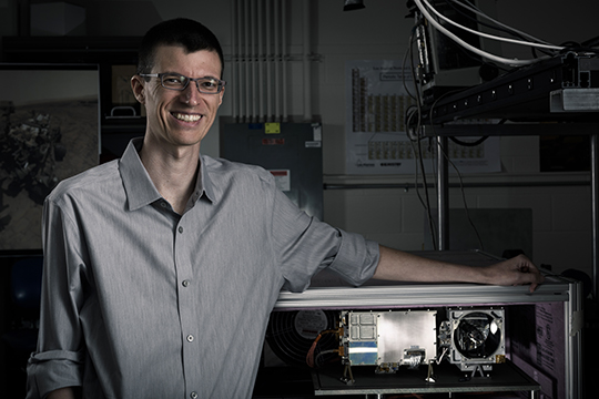 Patrick Gasda with the ChemCam engineering unit at TA-35.
