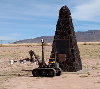 Figure. A radio-controlled HAZMAT Robot with an array of Lighthouse Detectors surveyed the Trinity nuclear test site. Photo credit: Brian Bingamon (Technology Services and Solutions, XIT-TSS)