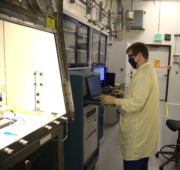 Los Alamos scientist using the newly installed CPC system in RLUOB.